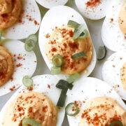 mayo-free deviled eggs with paprika and green onions