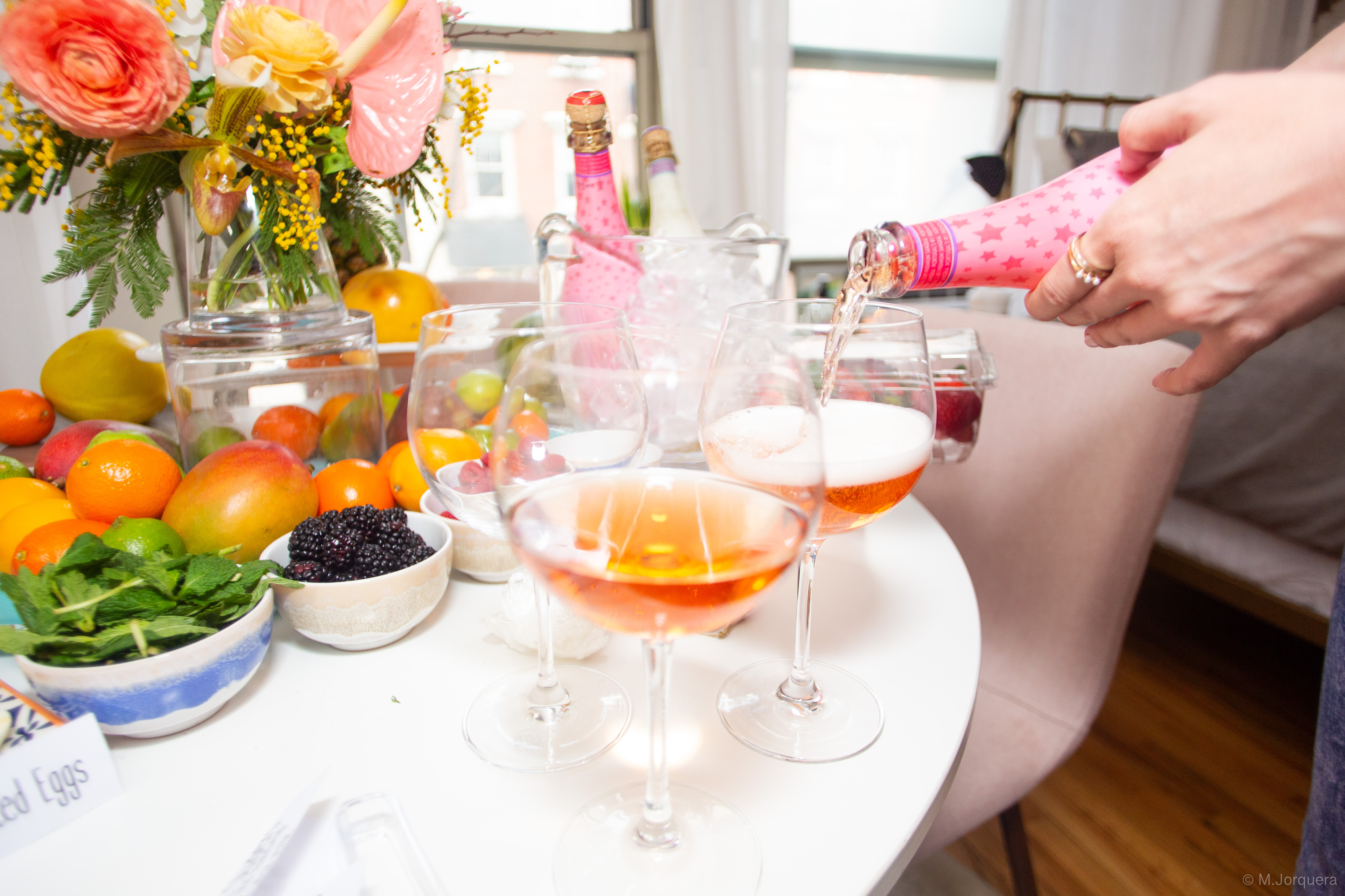 Galentine's Day Wine being poured into wine glass 