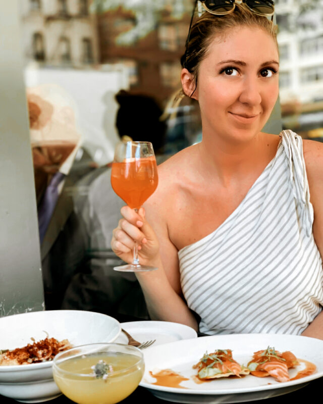 monica dimperio drinking aperol spritz in nyc