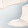 Outdoor Dining in the Hamptons under white umbrellas