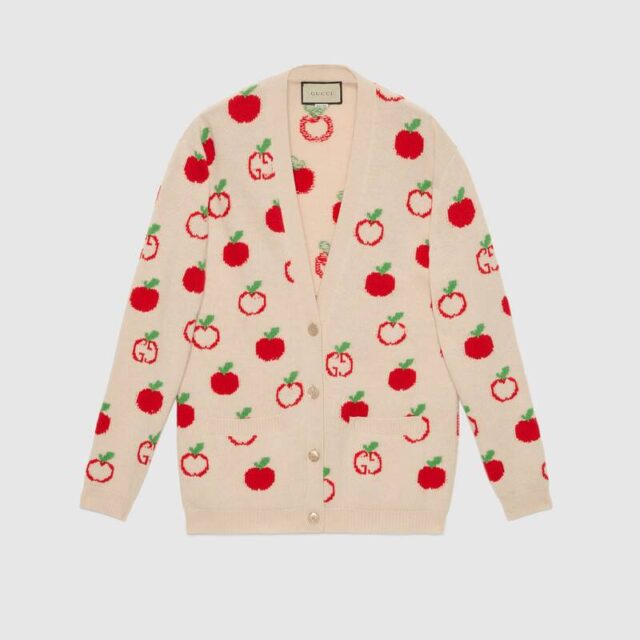 cream gucci wool cardigan with filled apples; apples not filled in and apples made with the gucci brand